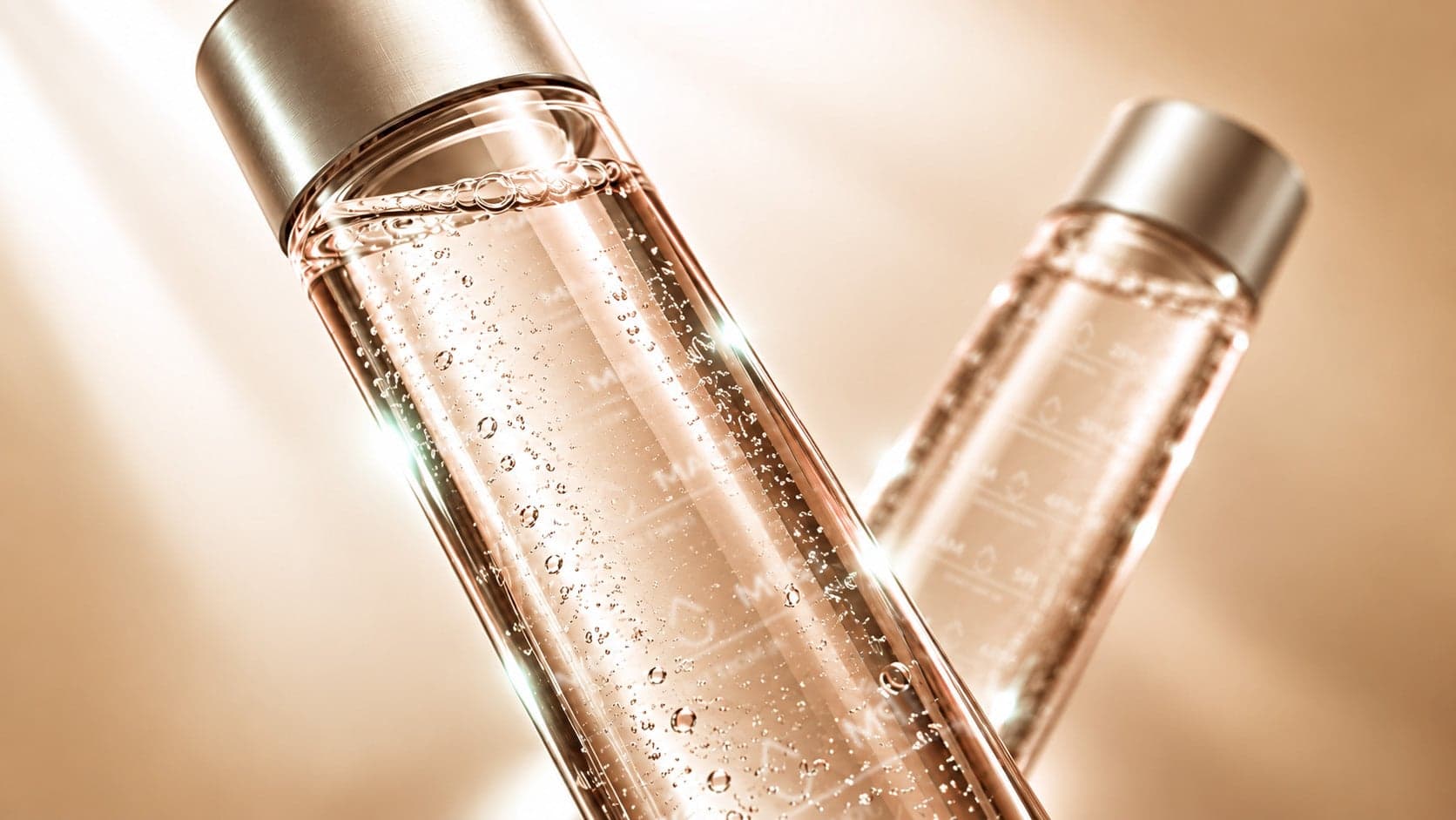 Two clear Easytive bottles with brushed metal caps in warm light